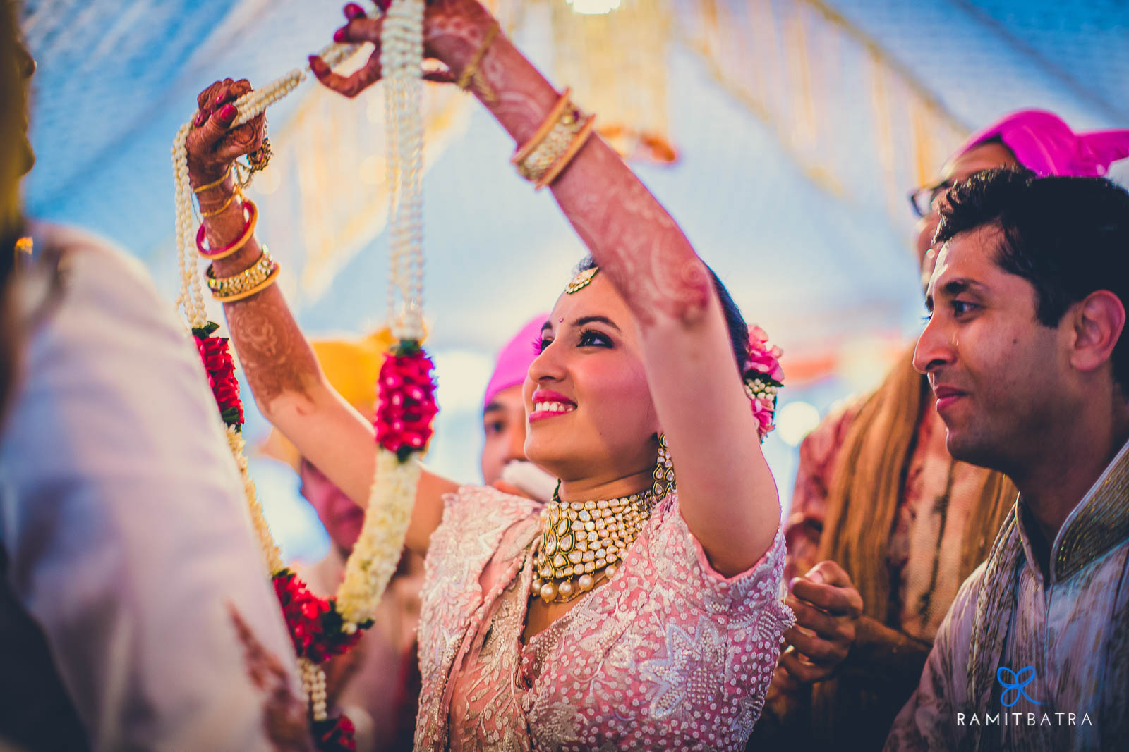 Varmala - Bride & Groom exchange garlands Leela Palace Udaipur